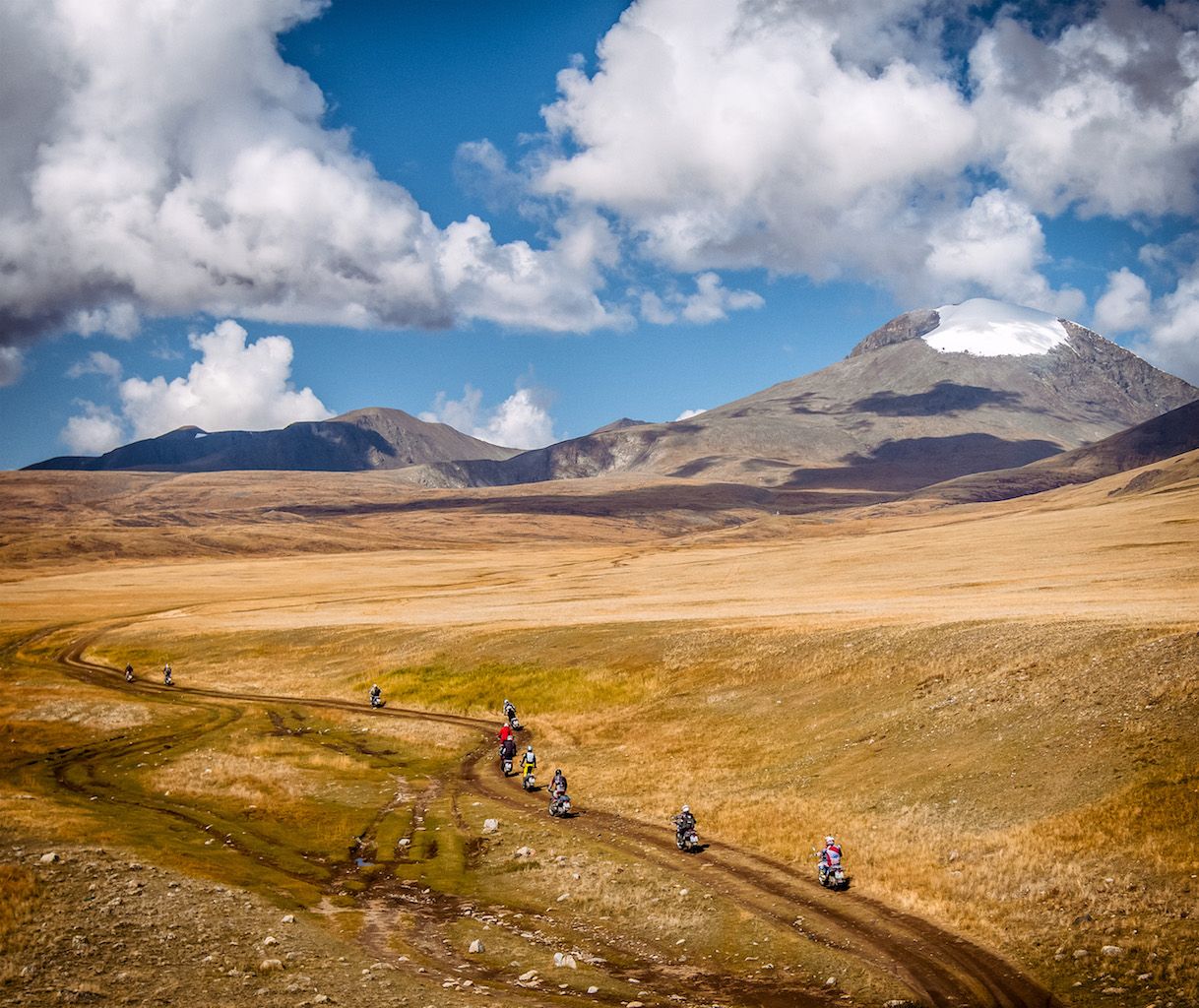 Mongolia mountains and motorcycle riders