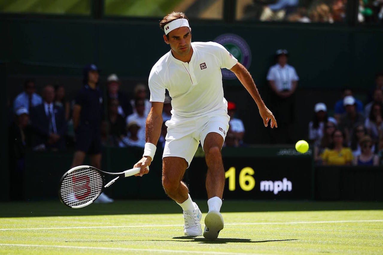 Tennis player swinging racket at the Miami Open