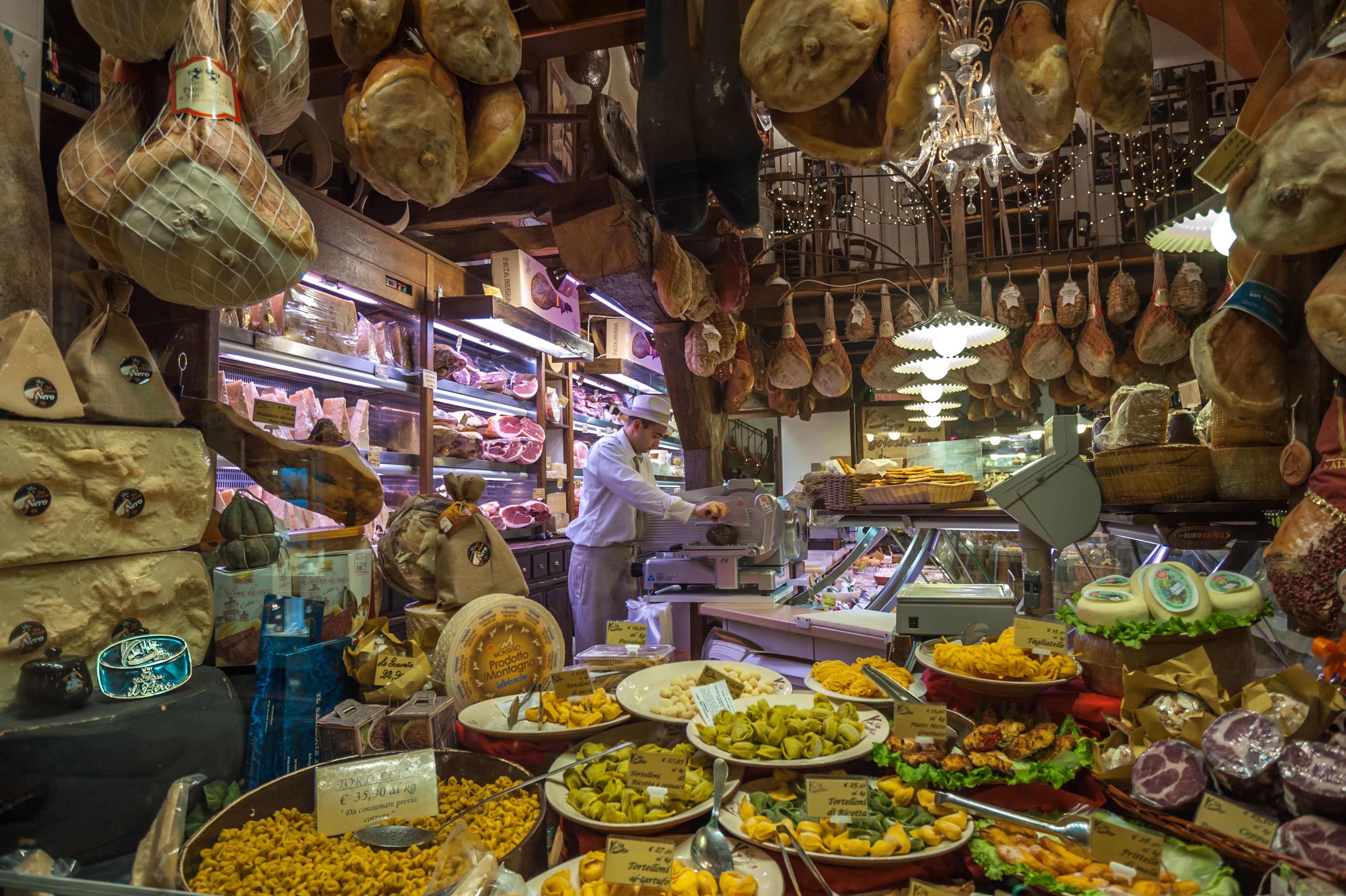 Window of typical grocery shop in Bologna
